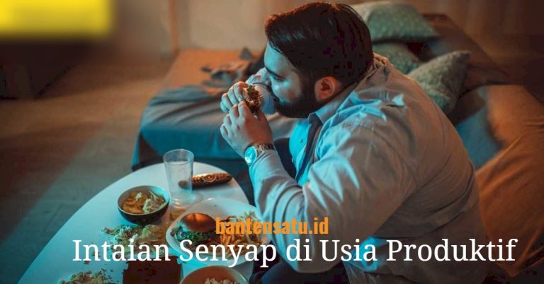 ilustrasi seorang pekerja muda yang duduk termenung di depan laptop saat malam hari dengan kotak sisa makanan cepat saji di sampingnya.