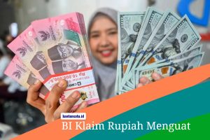 Layar monitor bursa efek menampilkan pergerakan grafik hijau nilai tukar rupiah dan deretan mata uang asing terhadap dolar AS.