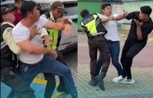 Dua pria terlibat adu fisik di area pengisian daya kendaraan listrik SPKLU Samanea, Tangerang.