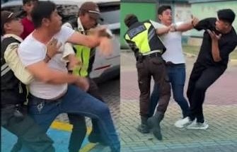 Dua pria terlibat adu fisik di area pengisian daya kendaraan listrik SPKLU Samanea, Tangerang.